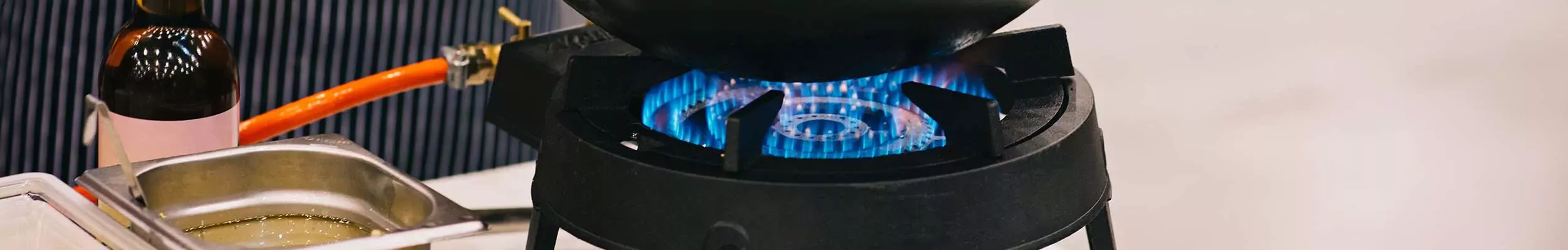 durable-propane-outdoor-wok-burner-with-blue-flames Durable outdoor wok burner on stand with blue flames