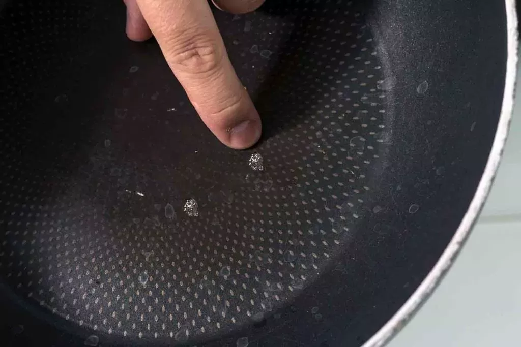 Scratch on non-stick PTFE pan
